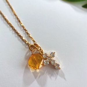 Yellow Swarovski and zirconia cross necklace